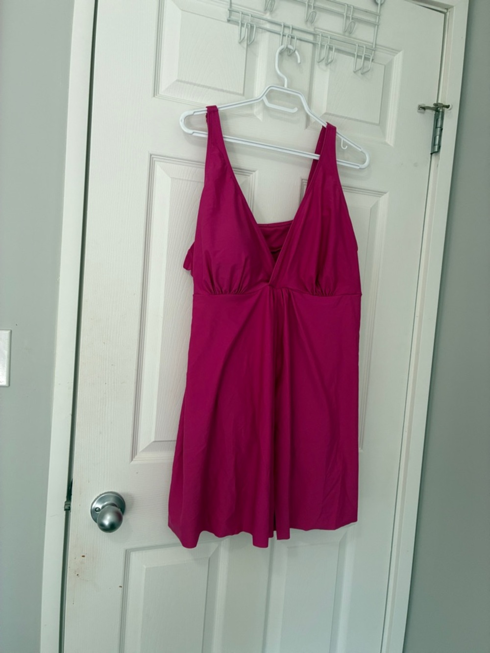 Nicole Miller magenta one piece bathing suit with adjustable straps